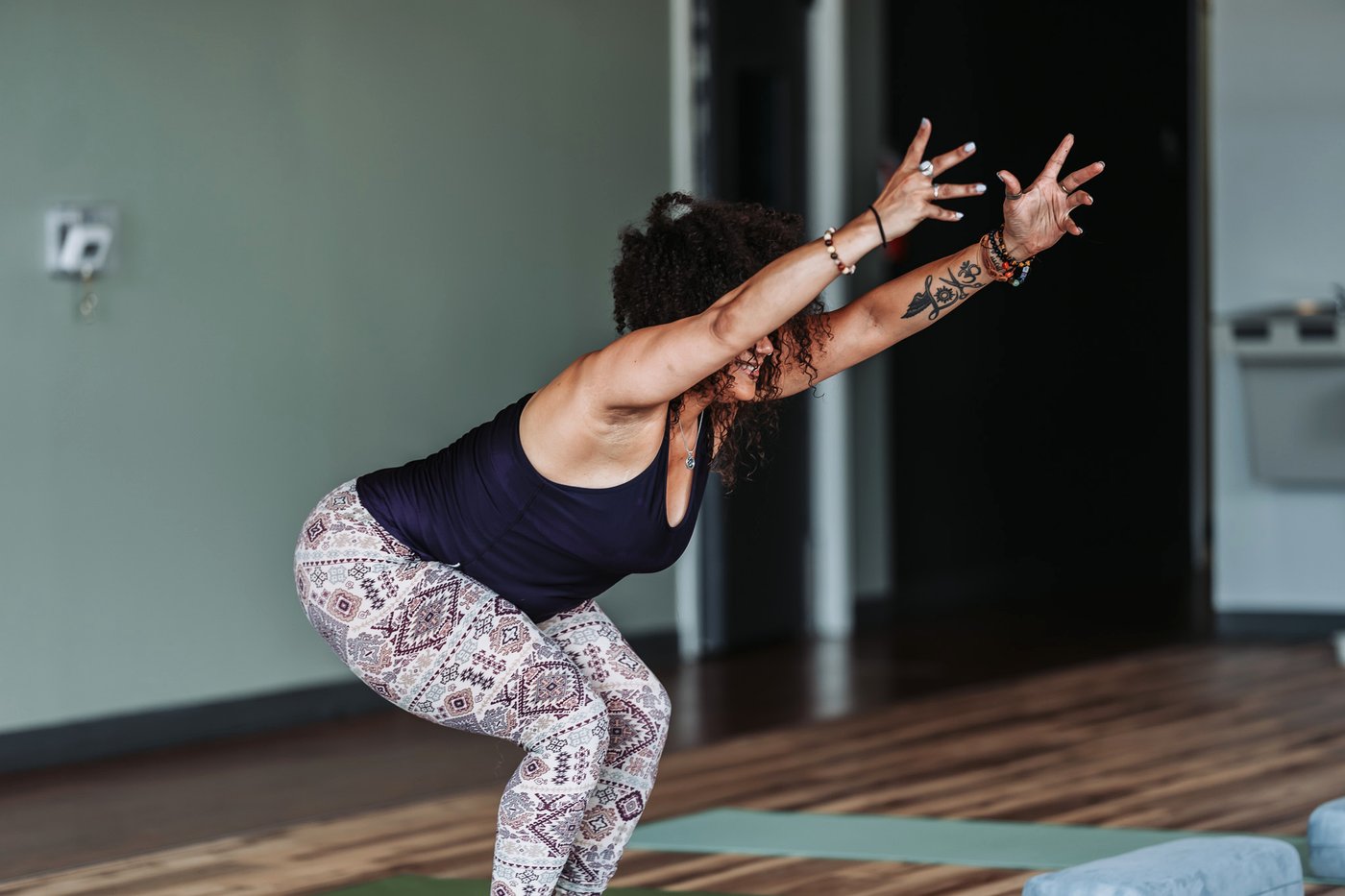 A strong standing backbend showing focus and control